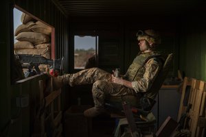 An Estonian Barkhane force soldier mans the checkpoint at the entrance of their base in Gao, eastern Mali, Sunday June 6, 2021