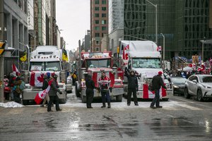 Truck drivers and others protest COVID-19 pandemic restrictions in Ottawa, Ontario, on Saturday, Feb. 12, 2022