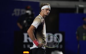 Alexander Zverev of Germany reacts during a match against to Jenson Brooksby of the U.S. at the Mexican Open tennis tournament in Acapulco, Mexico, Tuesday, Feb. 22, 2022