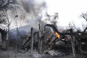 Damaged radar arrays and other equipment is seen at Ukrainian military facility outside Mariupol, Ukraine, Thursday, Feb. 24, 2022.