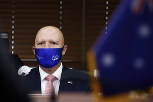 Australian Defense Minister Peter Dutton attends a meeting with his South Korean counterpart Suh Wook at the Ministry of National Defense in Seoul, South Korea, Monday, Sept. 13, 2021.