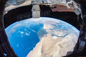 The SpaceX Dragon resupply ship is pictured attached to the International Space Station's Harmony module as the orbital complex flew 260 miles above the Nile River Delta in Egypt  on 13 August 2019