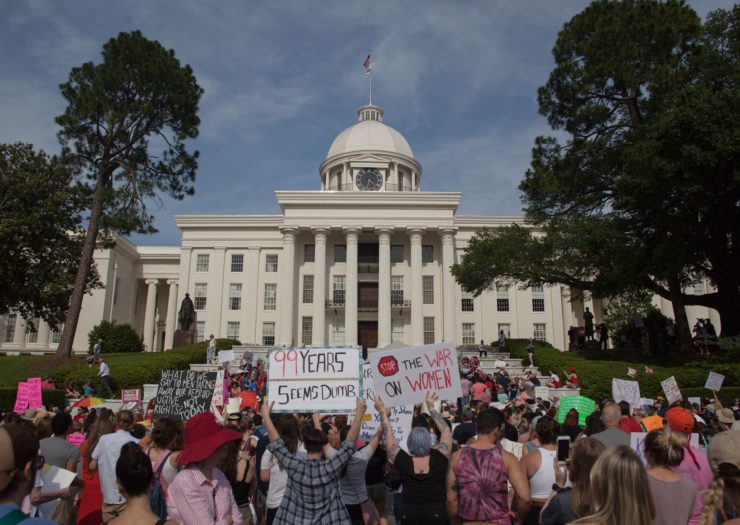 Photo of abortion rights demonstrators protest outside the State Capital building during the March For Reproductive Freedom in Montgomery