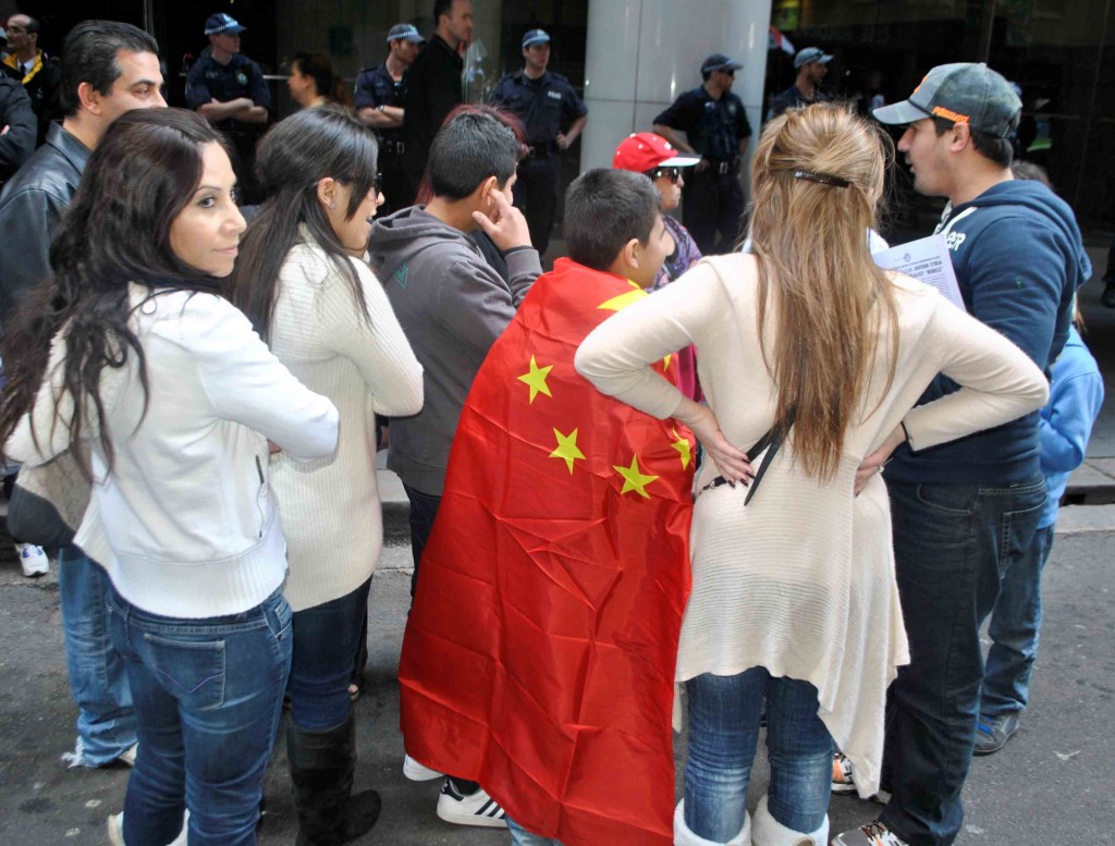 Many opponents of imperialist intervention in Syria have made a point of carrying the red, Five-Star flag of the Peoples Republic of China at protest rallies in Sydney.