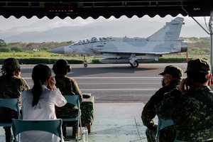 In this photo released by the Taiwan Presidential Office, a military jet taxis along a highway in Jiadong, Taiwan, Wednesday, Sept. 15, 2021