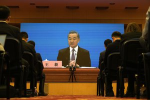 Chinese Foreign Minister Wang Yi speaks during a remote video press conference held on the sidelines of the annual meeting of China's National People's Congress (NPC) in Beijing, Monday, March 7, 2022