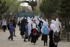 Afghan students leave school classes in a primary school in Kabul, Afghanistan on March 27, 2021