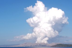 Taal Volcano spews white steam and ash as seen from Balete, Batangas province, south of Manila, Philippines on Saturday March 26, 2022.