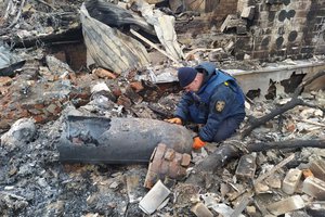 Servicemen of the Emergency service of Ukraine dispose Russian bombs during the battle of Chernihiv, 9 March 2022. In total, the Emergency service in the city worked on 22 requests for bomb disposal this day