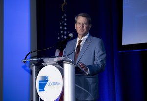 FILE Georgia Gov. Brian Kemp speaks at the Georgia Ports Authority 2022 State of the Port address, Thursday Feb. 24, 2022, in Savannah, Ga.