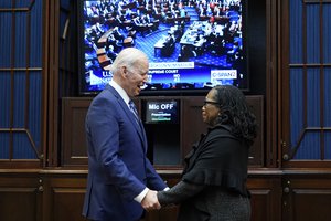 President Joe Biden and Supreme Court nominee Judge Ketanji Brown Jackson watch as the senate votes on her confirmation from the Roosevelt Room of the White House in Washington, Thursday, April 7, 2022