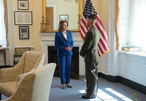 Leader Nancy Pelosi greets with 1st Lt. Joseph Rocha, US Marines