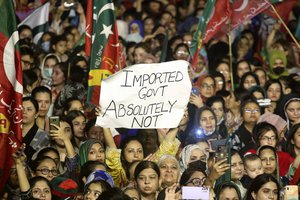 Supporters of deposed Prime Minister Imran Khan's party participate in a rally to condemn the ouster of their leader's government, in Karachi, Pakistan, Sunday, April 10, 2022