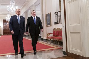 President Donald J. Trump walks with retired four-star U.S. Army General Jack Keane prior to presenting him with the Presidential Medal of Freedom, the nation’s highest civilian honor, Tuesday, March 10, 2020, in the East Room of the White House.