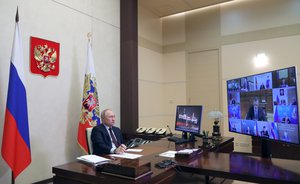 Russian President Vladimir Putin attends a meeting on the development of the Russian Arctic zone via videoconference at the Novo-Ogaryovo residence outside Moscow, Russia, Wednesday, April 13, 2022.