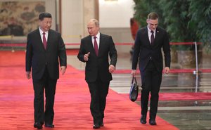 Xi Jinping and Vladimir Putin walks off the red carped to welcome Russian President Vladimir Putin, Beijing, China