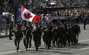 Canada's soldiers march along main Khreshchatyk Street during a military parade to celebrate Independence Day in Kiev, Ukraine, Friday, Aug. 24, 2018.