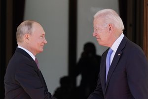 FILE - President Joe Biden and Russian President Vladimir Putin, arrive to meet at the 'Villa la Grange', June 16, 2021, in Geneva, Switzerland.