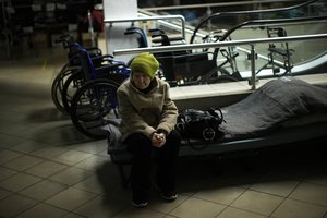 Lyudmyla Doroshenko rests in a reception center for displaced people in Dnipro, Ukraine, Thursday, April 28, 2022.