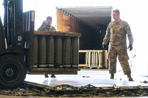 Airmen with the 436th Aerial Port Squadron place 155 mm shells on aircraft pallets ultimately bound for Ukraine, Friday, April 29, 2022, at Dover Air Force Base, Del. President Joe Biden asked Congress on Thursday for $33 billion to bolster Ukraine's fight against Russia, signaling a burgeoning and long-haul American commitment.