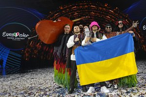 Kalush Orchestra from Ukraine celebrate after winning the Grand Final of the Eurovision Song Contest at Palaolimpico arena, in Turin, Italy, Saturday, May 14, 2022.