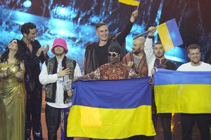 Kalush Orchestra from Ukraine celebrates after winning the Grand Final of the Eurovision Song Contest at Palaolimpico arena, in Turin, Italy, Saturday, May 14, 2022.