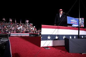 File - Former President of the United States Donald Trump speaking with supporters at a "Save America" rally at Country Thunder Arizona in Florence, Arizona.