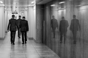 File - Secretary of State Antony J. Blinken and Counselor Derek Chollet depart the room after hosting a virtual ministerial meeting with key partners on Afghanistan, including Canada, France, Germany, Italy, Japan, the United Kingdom, Turkey, Qatar, the European Union, and NATO, at the U.S. Department of State in Washington, D.C., on August 30, 2021.