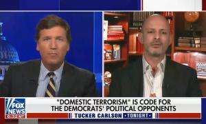 still of Tucker Carlson, Nicholas Giordano; chyron: "Domestic terrorism" is code for the Democrats' political opponents
