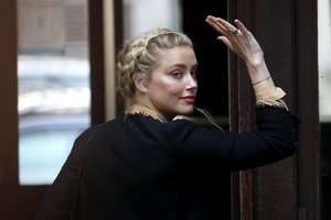 US Actress Amber Heard arrives at the High Court in London in London, Wednesday, July 22, 2020.