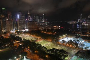 People gather for a vigil for the victims of the 1989 Tiananmen Square Massacre at Victoria Park in Causeway Bay, Hong Kong, Thursday, June 4, 2020, despite applications for it being officially denied.