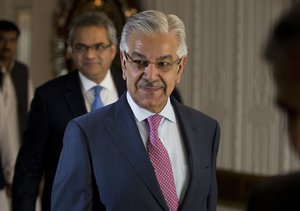 Pakistan's Foreign Minister Khawaja Mohammad Asif arrives to address a news conference in Islamabad, Pakistan, Thursday, Sept. 7, 2017.