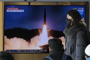 A TV screen shows a file image of North Korea's missile launch during a news program at the Seoul Railway Station in Seoul, South Korea, Sunday, Jan. 30, 2022. North Korea on Sunday fired what appeared to be the most powerful missile it has tested since U.S. President Joe Biden took office