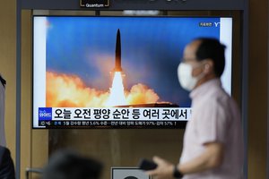 A TV screen showing a news program reporting about Sunday's North Korean missile launch with file image, is seen at a train station in Seoul, South Korea, Sunday, June 5, 2022.