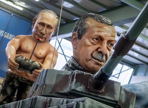 Two figures depicting Vladimir Putin and Recep Tayyip Erdogan are shown during a press preview for the Mainz carnival, Germany