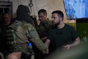 Ukrainian President Volodymyr Zelensky meets Ukrainian forces during a working trip to the Zaporizhzhia region and Donbas, Ukraine, 5 June, 2022.