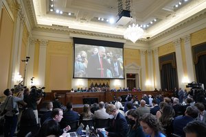 An image of former White House Chief of Staff Mark Meadows is displayed on a screen as the House select committee investigating the Jan. 6 attack on the U.S. Capitol holds its first public hearing to reveal the findings of a year-long investigation, on Capitol Hill, Thursday, June 9, 2022, in Washington.