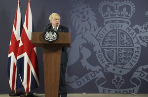 Britain's Prime Minister Boris Johnson makes a speech at Blackpool and The Fylde College in Blackpool, England, Thursday June 9, 2022