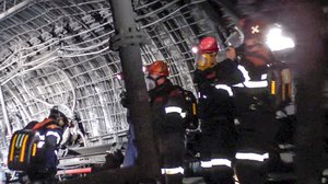 In this handout photo taken from video released by Russian Emergency Ministry Press Service, rescuers prepare to work at a coal mine near the Siberian city of Kemerovo, about 3,000 kilometres (1,900 miles) east of Moscow, Russia, Thursday, Dec. 2, 2021.