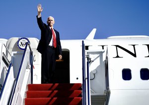 Vice President Mike Pence disembarks Air Force Two at Wilkes-Barre/ Scranton International Airport, in Avoca, Pa. Monday, Oct. 21, 2019, and is greeted by guests and supporters.