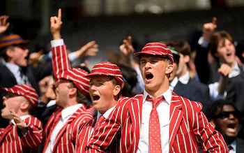 Pupils watch on during the Eton v Harrow Cricket Match at Lord's Cricket Ground on June 28, 2022 in London, England.