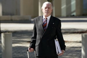 Roberto Guillermo Bravo, a former Argentine navy officer, leaves federal court Monday, June 27, 2022, in Miami