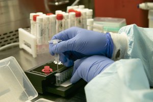 CAMP LEMONNIER, Djibouti (April 23, 2021) Hospital Corpsman 2nd Class Wei Xu, from Lemoore, Calif., prepares a swab sample for COVID-19 testing at the Naval Medical Research Unit (NAMRU) at Camp Lemonnier on April 23, 2021.