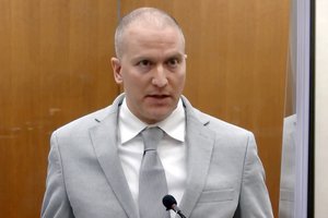 FILE - Former Minneapolis police Officer Derek Chauvin addresses the court as Hennepin County Judge PeterCahill presides over Chauvin's sentencing at the Hennepin County Courthouse in Minneapolis, on June 25, 2021.