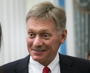 In this Friday April 6, 2018 file photo, Russian President Vladimir Putin's spokesman Dmitry Peskov smiles after a presentation ceremony for presidential awards