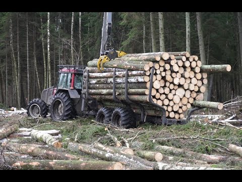 Logging with Valtra A93 forestry tractor, large trailer