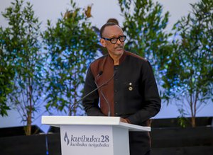 Rwanda's president Paul Kagame speaks to survivors and dignitaries at the Kigali Genocide Memorial in Kigali, Rwanda Thursday, April 7, 2022