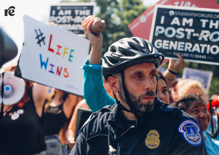 Capitol police surrounded by anti-abortion activists