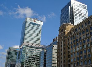 HSBC building stands amongst other skyscrapers in the Canary Wharf business district of London in London, UK