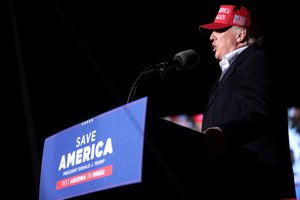 File - Former President of the United States Donald Trump speaking with supporters at a "Save America" rally at Country Thunder Arizona in Florence, Arizona.